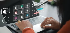 Woman working on laptop joined an online video conference with calendar and clock icon representing remote work scheduling and digital business collaboration